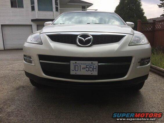 White 2009 Mazda CX-9 front view with license plate JD1 55H