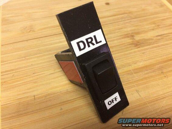 I made this plastic switch holder for the cubby, but the adhesive wouldn't hold and it ended up falling to pieces as I installed it.....