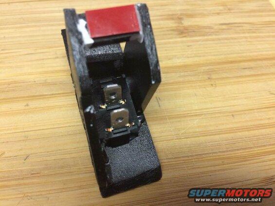 I made this plastic switch holder for the cubby, but the adhesive wouldn't hold and it ended up falling to pieces as I installed it.....