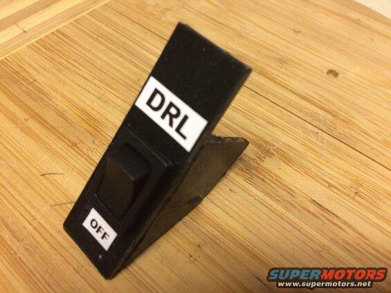 I made this plastic switch holder for the cubby, but the adhesive wouldn't hold and it ended up falling to pieces as I installed it.....
