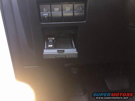 Interior dashboard with DRL switch and other vehicle control buttons