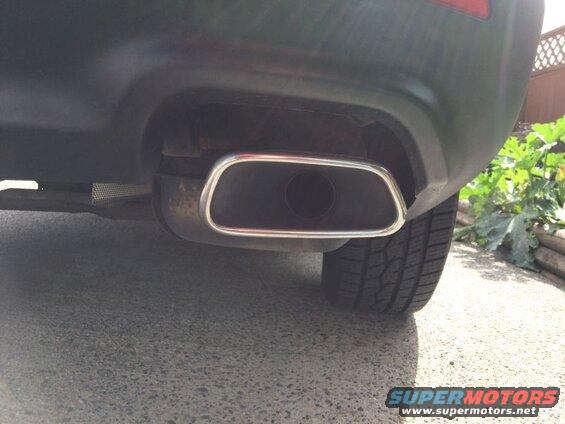 The right muffler is hanging lower than the left.