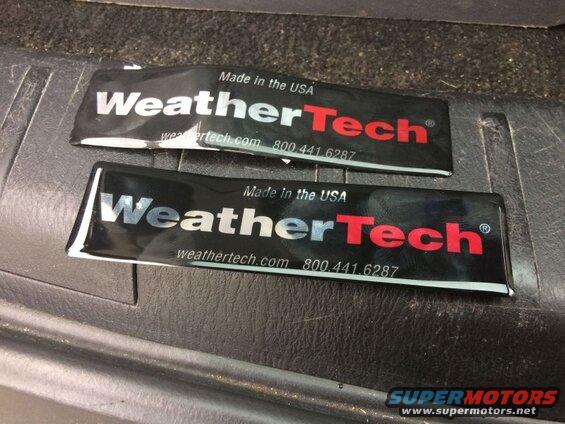 Not a fan of mfg decals. Besides, the mats look better "debadged".