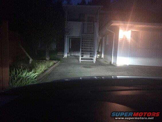 2009 Mazda CX-9 front view at night, parked in driveway.