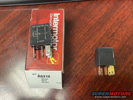 Black Intermotor relay with part number TU-12370C-23 next to its R6310 packaging.