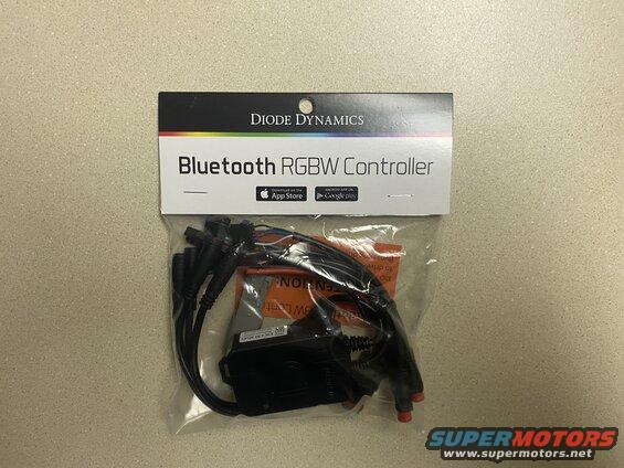 Diode Dynamics Bluetooth RGBW Controller packaging with cables inside.