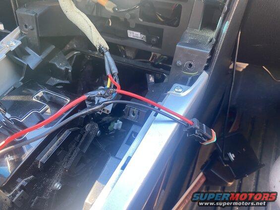 Dash pulled apart. I tapped into the wire I used for an auxilliary 12v outlet which is ignition hot.