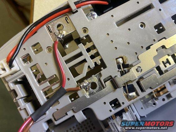 Wires routed, shrinked together and tied down. Wiring connector on as well.