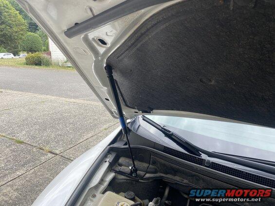 Re-install the liner and install the struts.