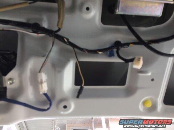 Routed the wire down the right side of the tailgate, following the main harness.