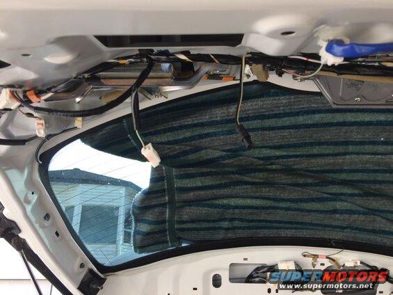 Routed the wire down the right side of the tailgate, following the main harness.