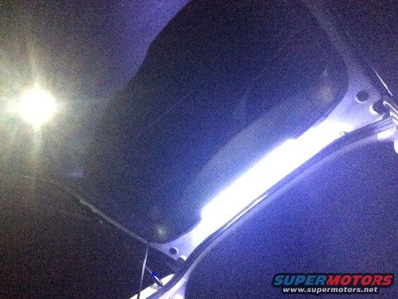 Interior of a vehicle with bright LED lighting.