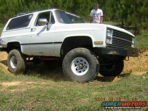 White 1984 Chevrolet Blazer with lifted suspension and off-road tires
