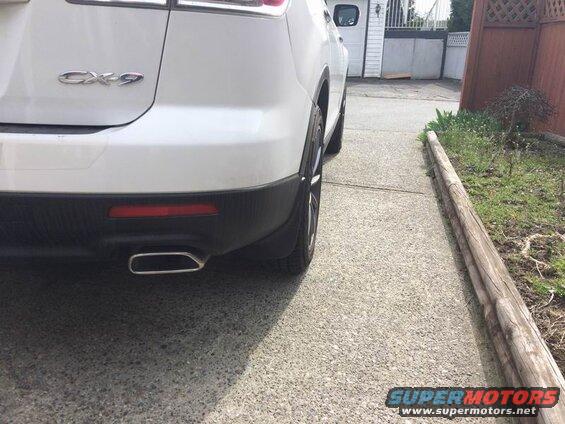 White Mazda CX-9 rear passenger side view