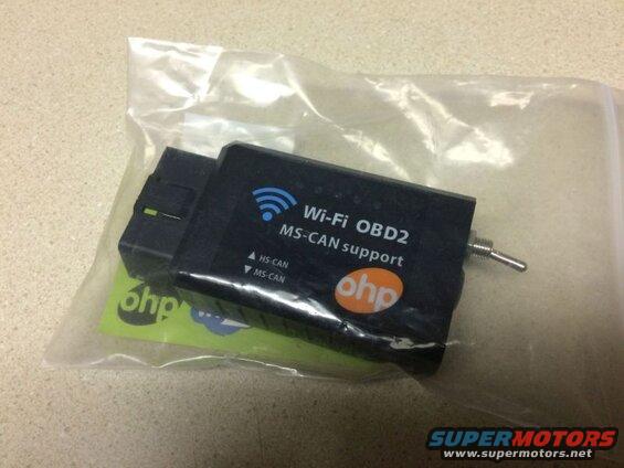 Black Wi-Fi OBD2 MS-CAN support adapter in plastic bag with "ohp" logo.