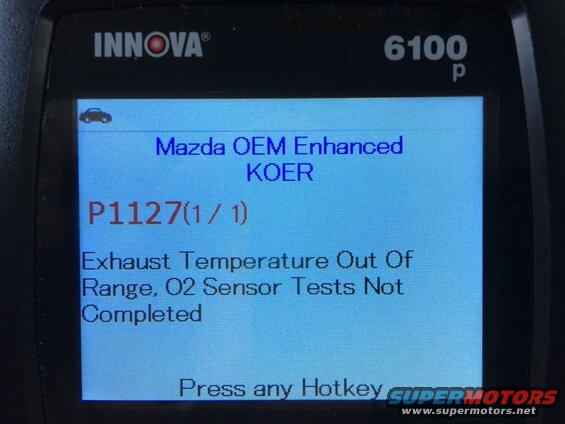Innova 6100 diagnostic scanner showing Mazda P1127 error code.