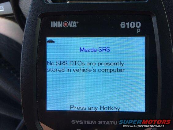 Innova 6100p diagnostic tool screen showing Mazda SRS system status.