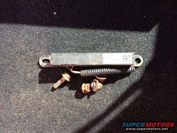 Rear keyless entry antenna (behind bumper). One bolt was seized, causing the antenna to move, and before I knew it, the wires came out of the plug.
