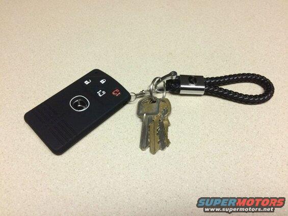 The icons on the right side are different. Used a red felt marker to make the top one resemble the keyfob "panic" button.