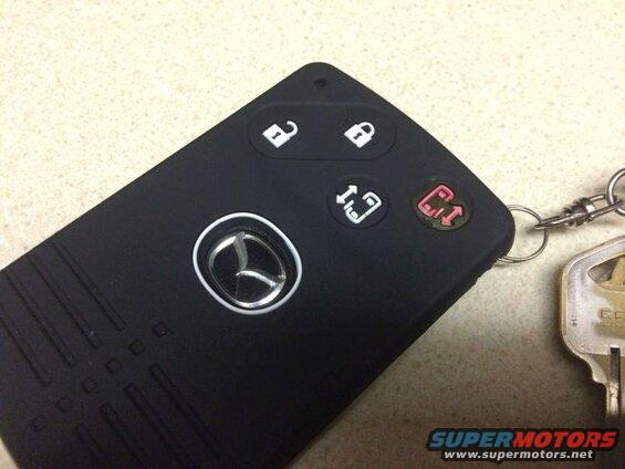 The icons on the right side are different. Used a red felt marker to make the top one resemble the keyfob "panic" button.