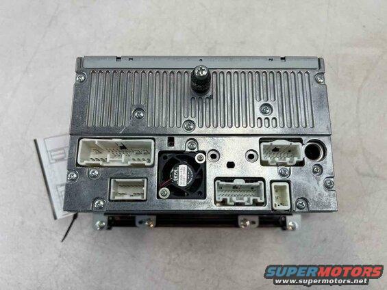 Rear view of car stereo with connectors and fan