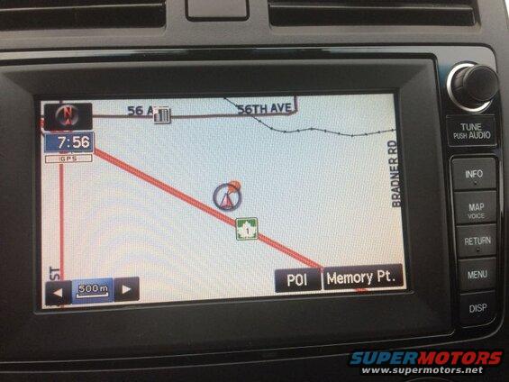 Car navigation screen showing map, time 7:56, route on 56th Ave and Bradner Rd, and destination Memory Pt.