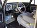 1978 Ford F-150 - Interior view of a 1978 Ford F-150, a custom steering wheel and aftermarket gauges.
