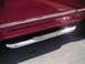 1994 Ford Bronco - Close-up of Westin step bars on a vehicle's lower body panel.