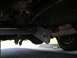 1994 Ford Bronco - This photo shows the undercarriage of a vehicle, focusing on the step bars and suspension components.