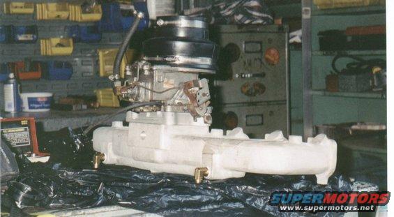 intake.jpg This is the Clifford water-heated intake with the 2-bbl from a 351.  Replaces the 1-bbl and exhaut heated stock intake