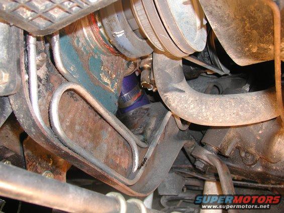 Engine hoses and pulleys with a blue filter labeled "BLUE ONE"