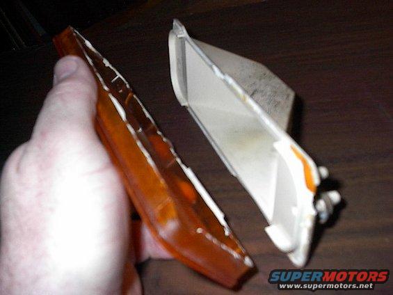 picture-002.jpg Lense busted loose of housing.  Sacrifice housing, save lense.