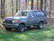1990 Ford Bronco - That license plate mount on the front bumper doubles as a fold-down step.