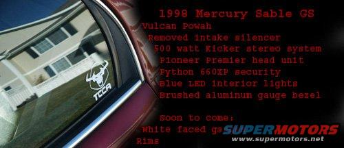 Red car door with a TCCA sticker and reflection of a house. Text lists 1998 Mercury Sable GS modifications