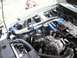 2002 Ford Mustang - Close-up view of a car's engine bay, an upgraded intake system.