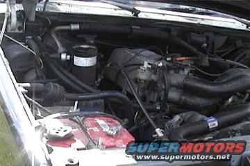 Engine bay with visible SuperMotors watermark