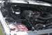 1989 Ford Bronco - The engine bay of a vehicle is shown, with a watermark from SuperMotors visible in the lower right corner.