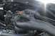 1989 Ford Bronco - Close-up view of the engine compartment, showing various components and hoses.