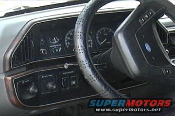 1989 Ford Bronco interior dashboard with gauges and steering wheel