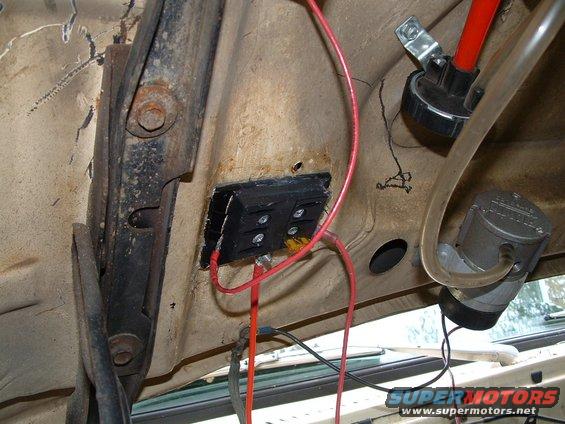 good place for a fuse block. underside of the hood above the heater core