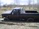 1981 Ford Bronco - and he gets pretty stuck. Bottomed out on both axles with opposite wheels spinning