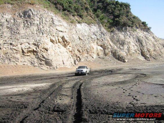 1070757_img.jpg friend playing in the mud. those are his bogger tracks :D