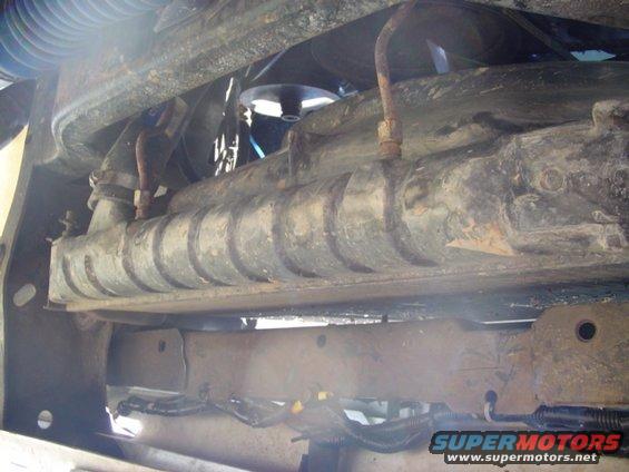 Radiator and fan shroud assembly from underneath a vehicle