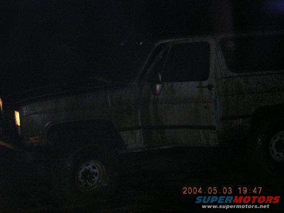 Side view of a K5 Blazer, looks like it's seen better days. The date stamp says 2004