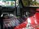 1996 Ford Bronco - First, pull out the rear seat, carpet, and interior panels.