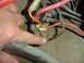 1978 Ford Bronco - Detail of starter solenoid wiring, showing connections and a hand pointing to a specific part.