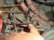 1979 Ford Bronco - This image shows a close-up view of the engine bay wiring harness and connections.