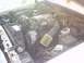 1991 Ford Crown Victoria - The engine bay shows a V8 engine with an aftermarket air filter installed.