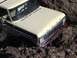 1979 Ford Bronco - This 1978 Ford Bronco is stuck on a rocky incline, with its front-right wheel partially visible.