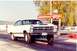 1967 Ford Fairlane - A white 1966 Ford Fairlane drag car is captured in a 3/4 front view at a drag strip.